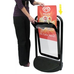 A Swinger 2000 Poster holding Pavement Sign - (White FRAME )